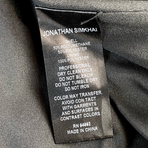 JONATHAN SIMKHAI • Black Vegan Leather Jayla Pleated Asymmetrical Midi Skirt, 2 - Picture 14 of 16